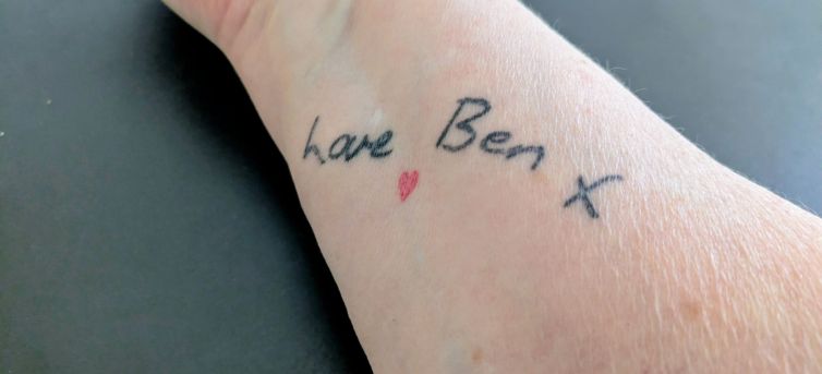 Tattoo saying Love Ben